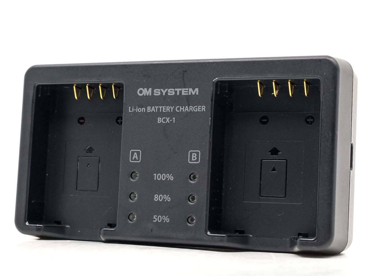 OM SYSTEM BCX-1 Charger · Hauptbild